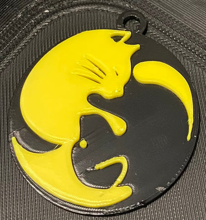 Cat & Dog Ying Yang Keyring - 45980.300 Black & Yellow